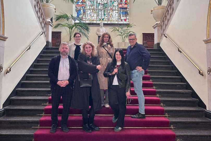The team on the stairs at the RUG headquarters